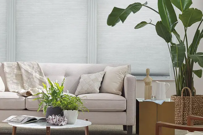 Applause Honeycomb Shades closed over sofa