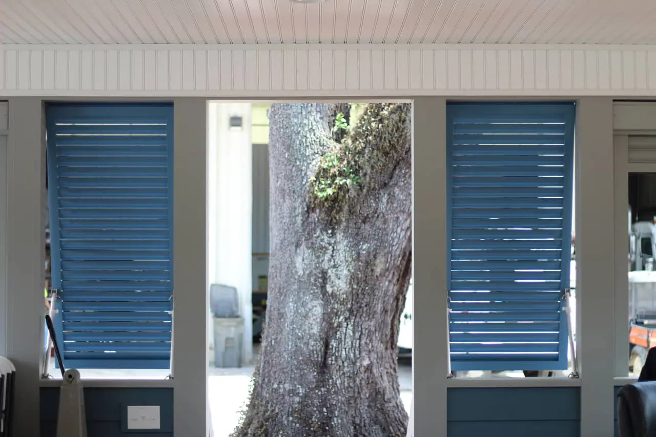 Pair of Bahama shutters on a house