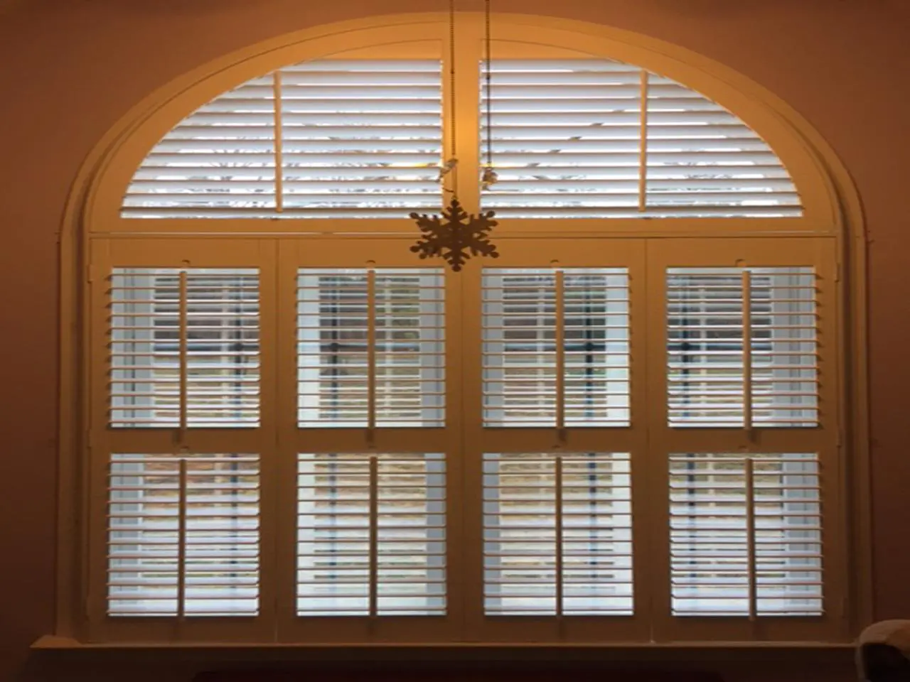 interior shutters on bedroom windows