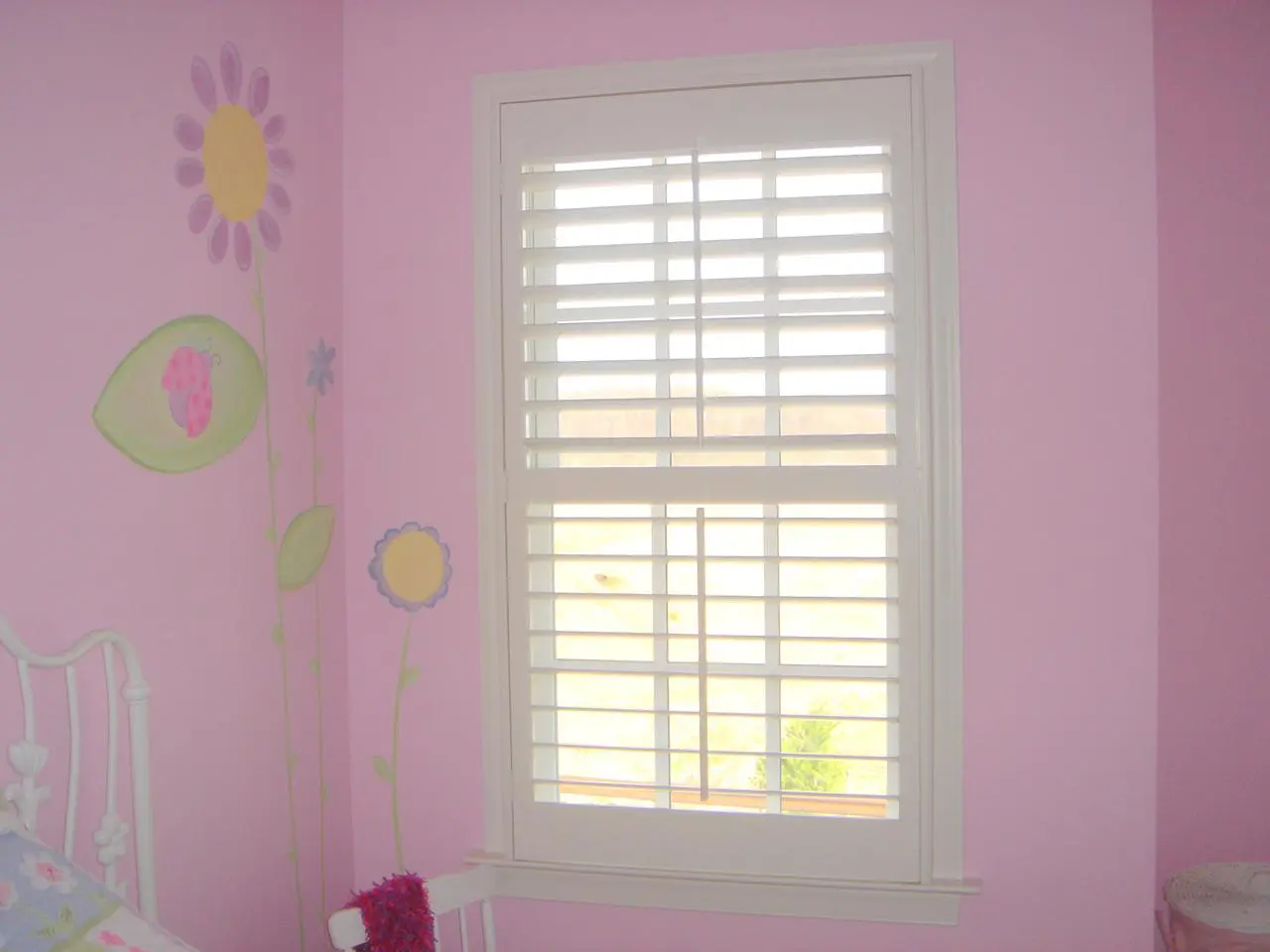 interior shutters on bedroom windows
