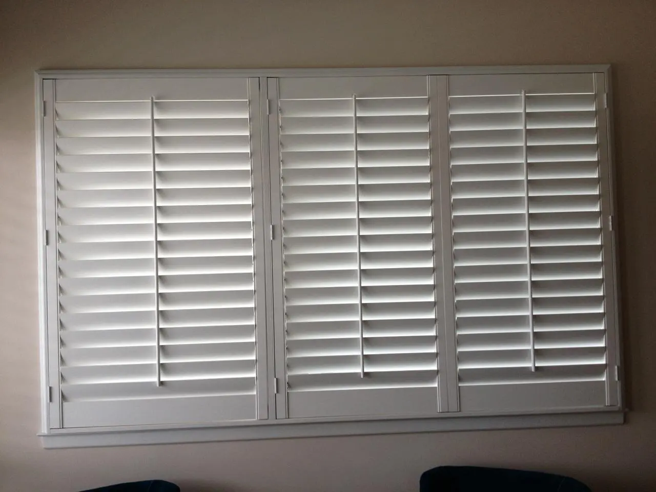 interior shutters on bedroom windows