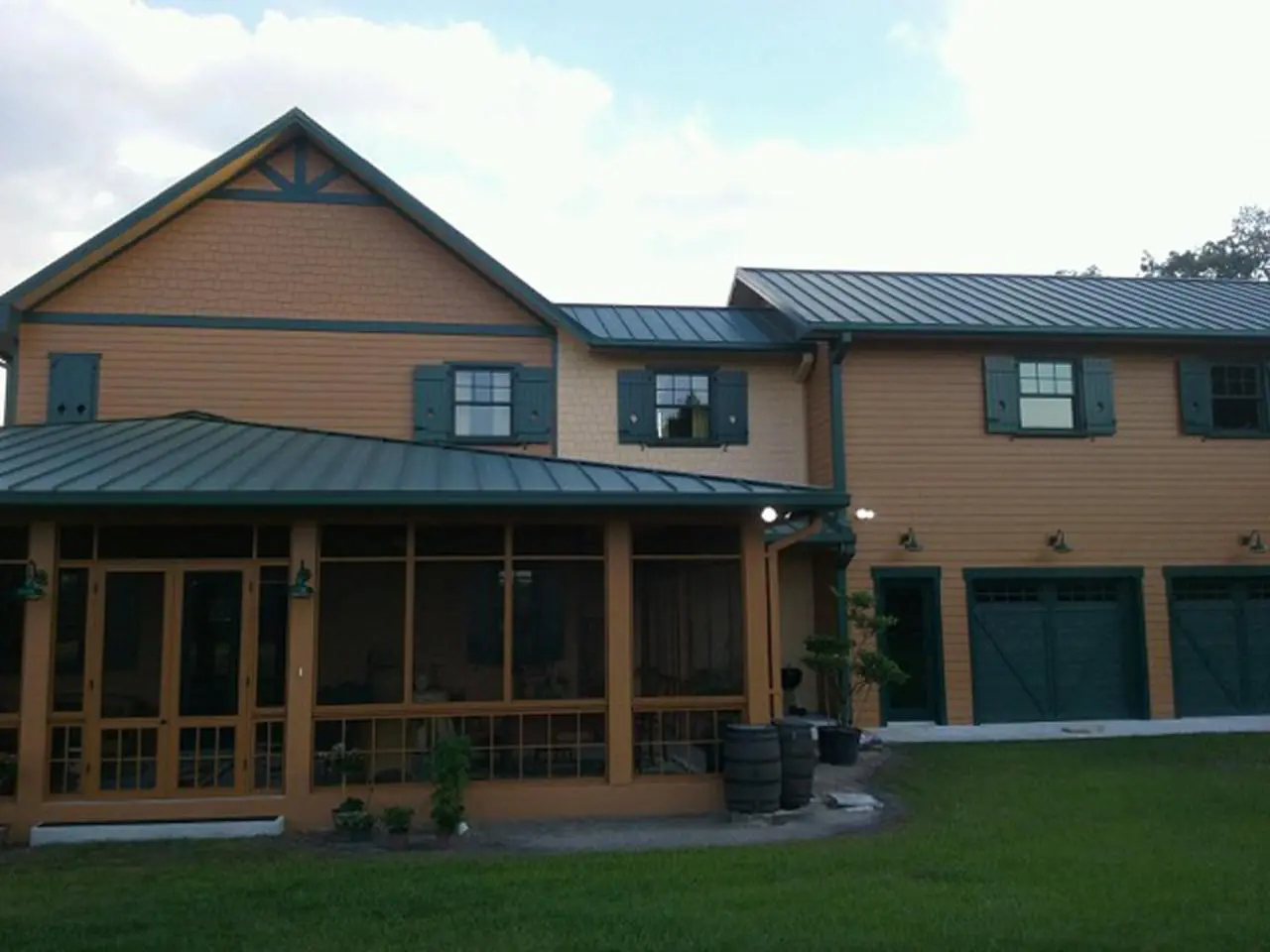 Decorative board and batten shutters on a house