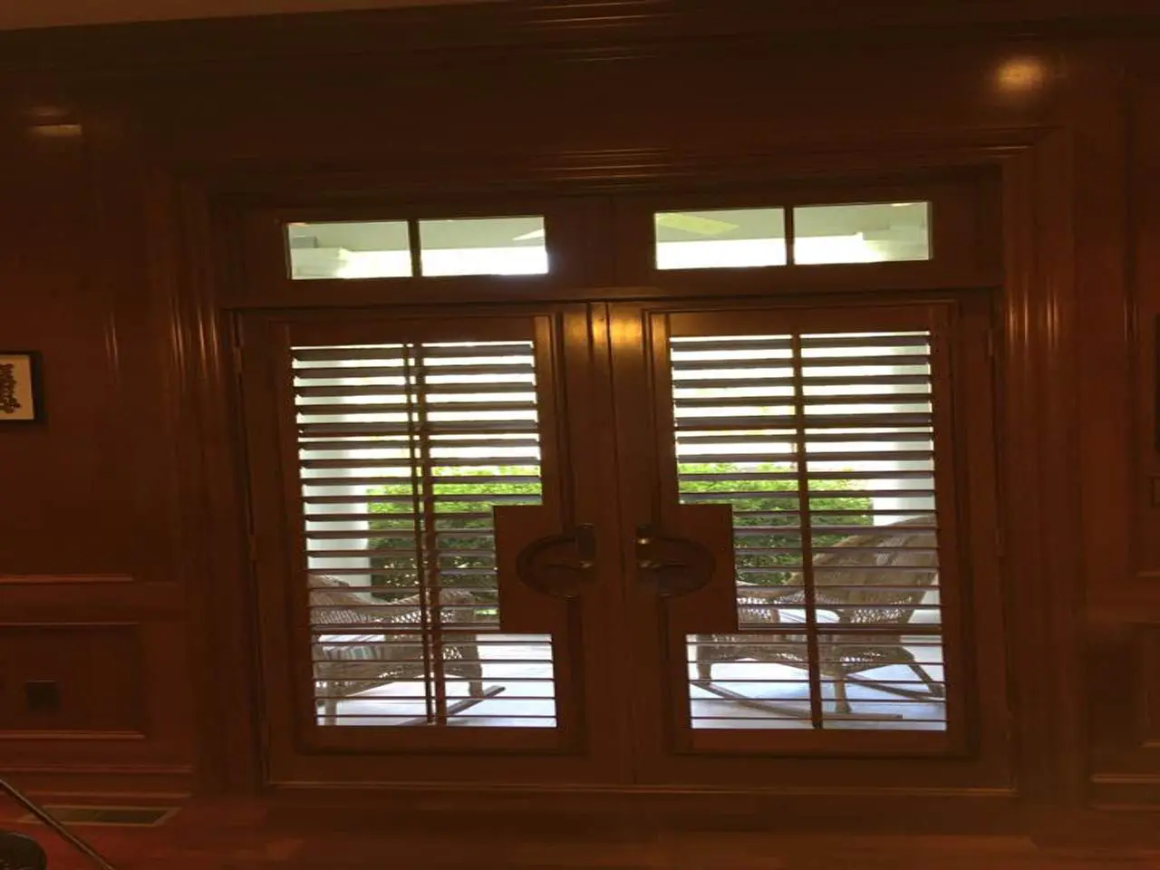 French doors with stained shutters