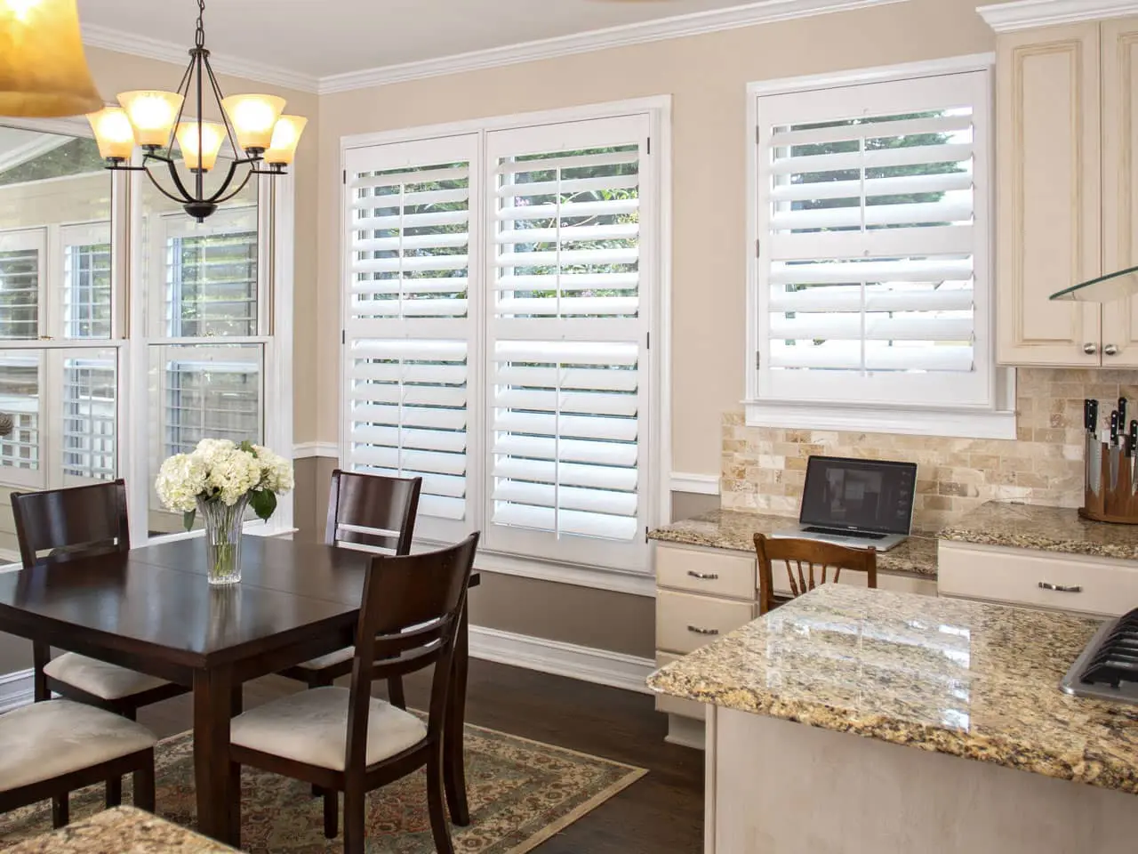 Heritage wood plantatin shutters on kitchen windows