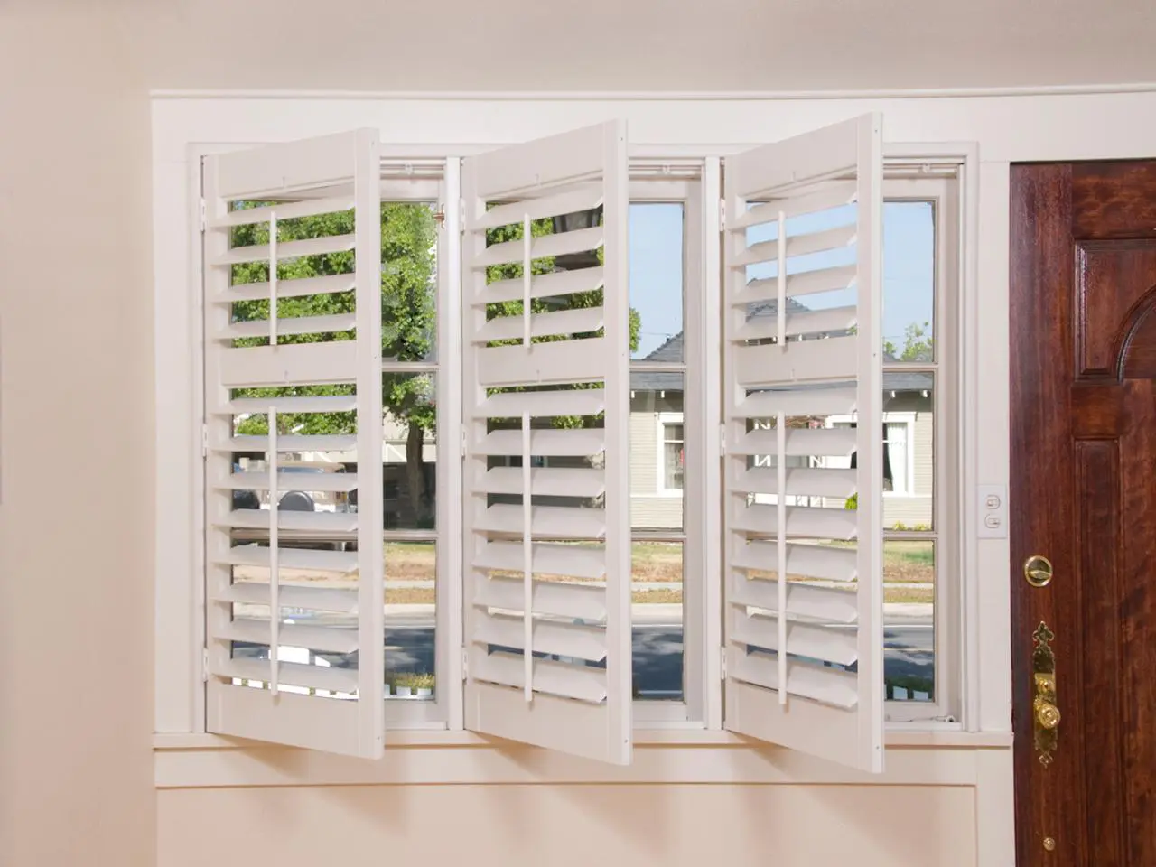 Partially opened shutters away from windows