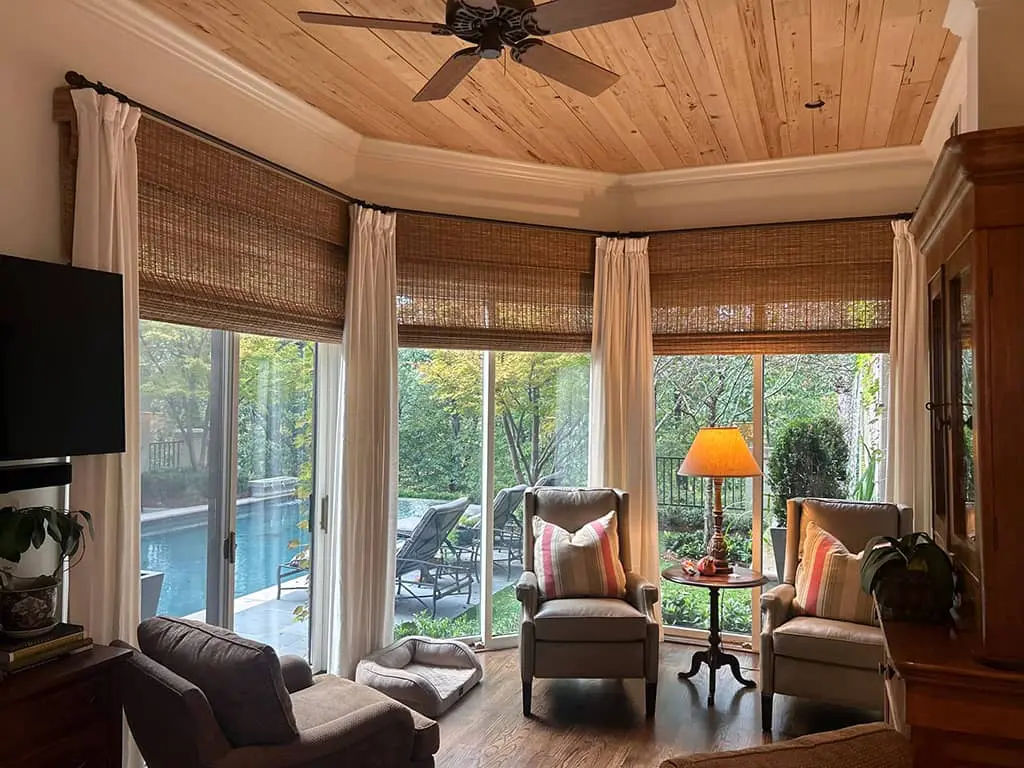 beautiful fall view below the Roman shades