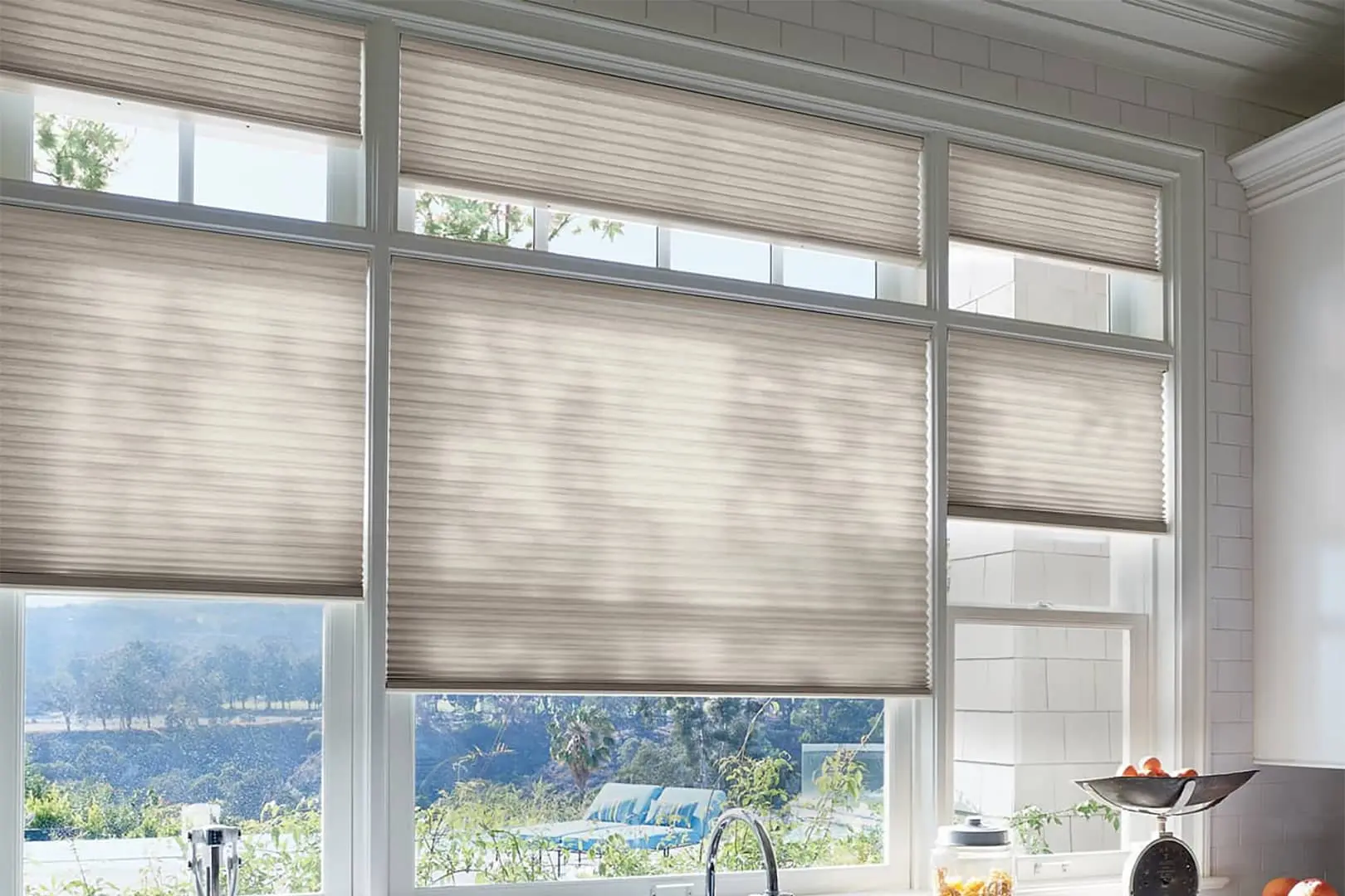energy-efficient honeycomb shades on kitchen windows