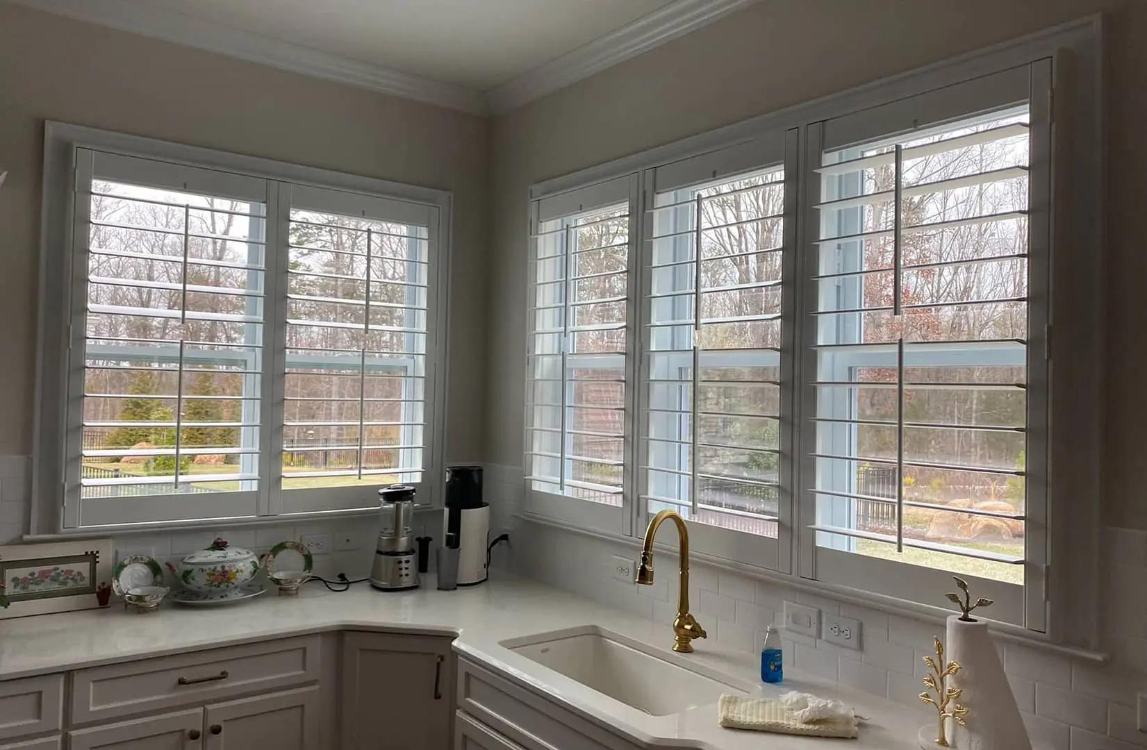kitchen windows with faux wood plantation shutters