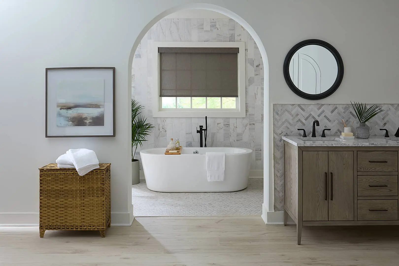 roller shades above a free-standing bathtub
