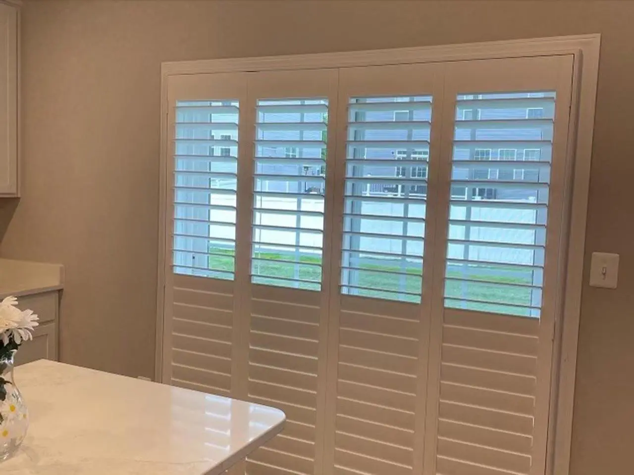 Louverwood shutters in a kitchen top open, bottom closed