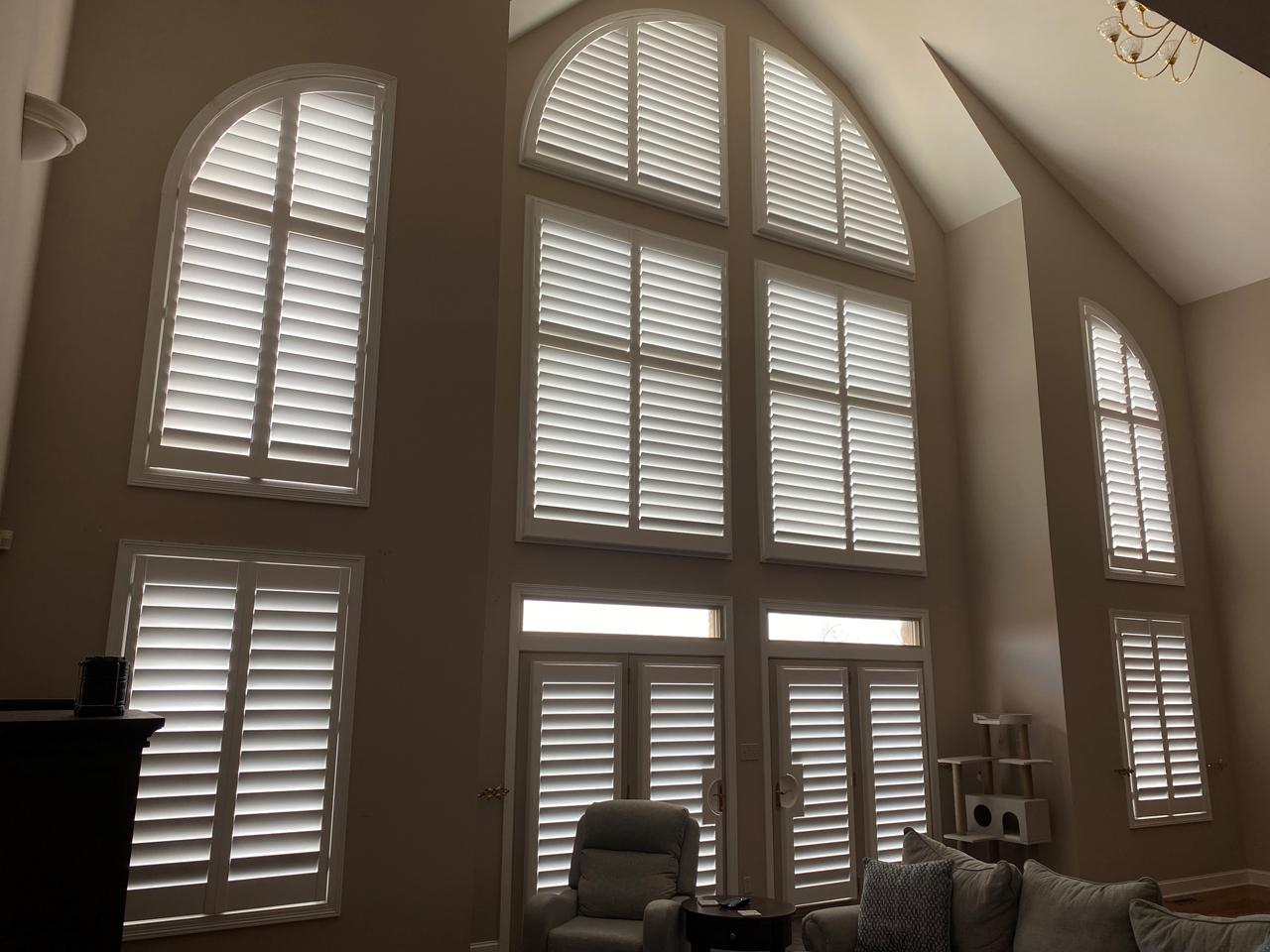 French doors, arches and rectangular shutters