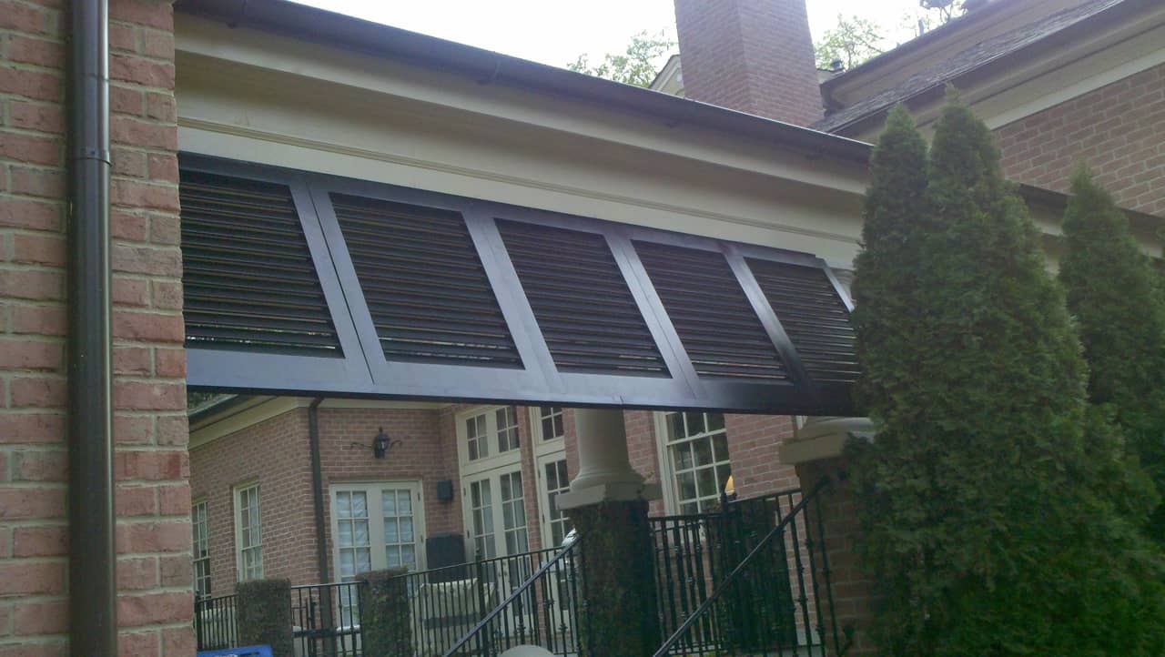 Bahama shutters on a breezeway