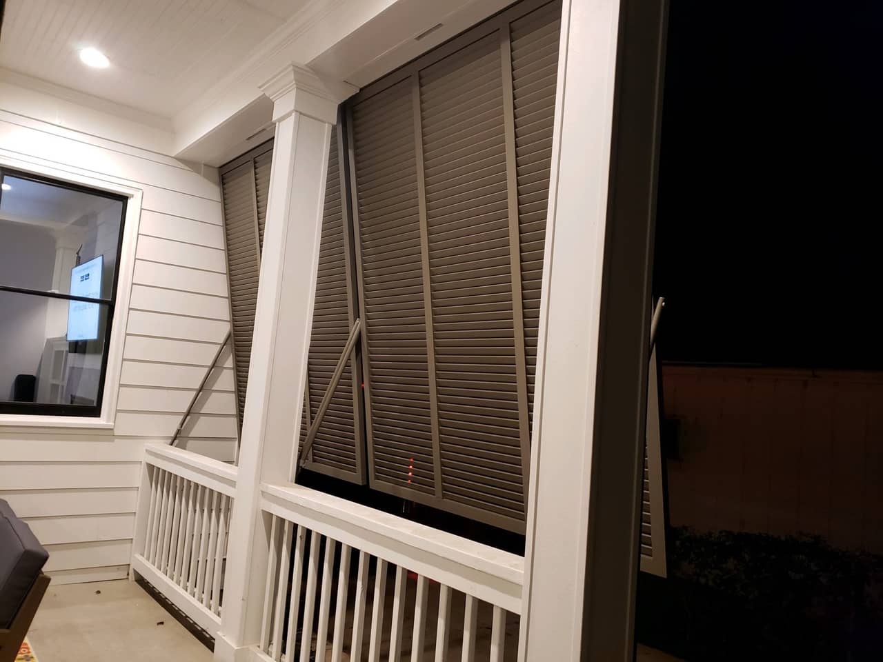 Bahama shutters on a porch -inside view