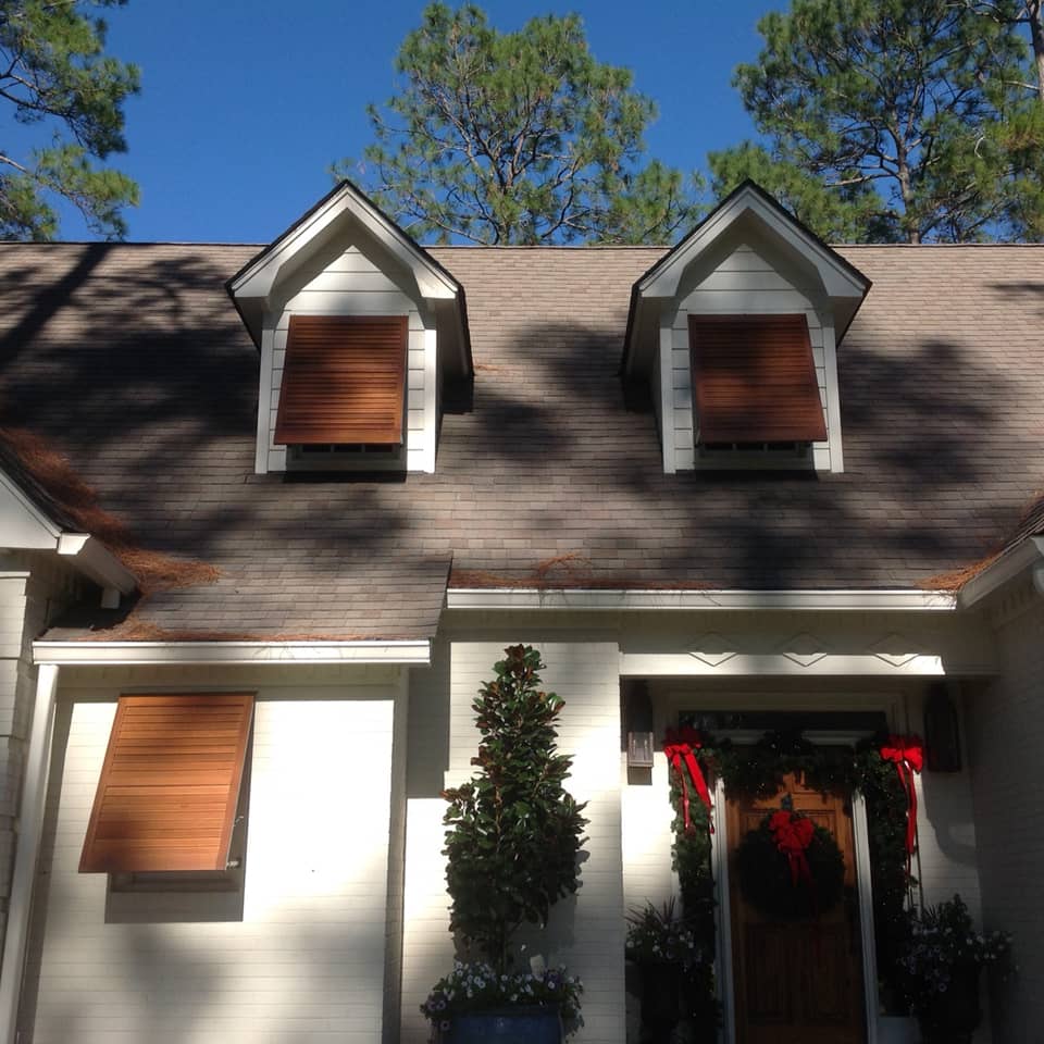 Wood Bahama shutters on a porch