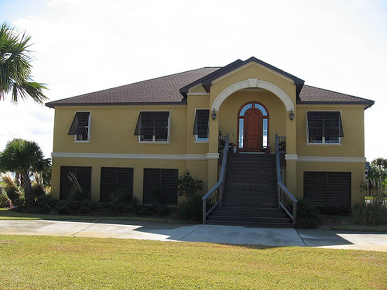 Dark Bahama shutters on a house