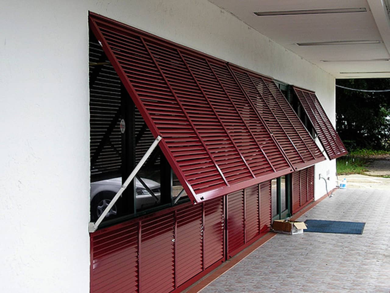 Red Bahama shutters on house