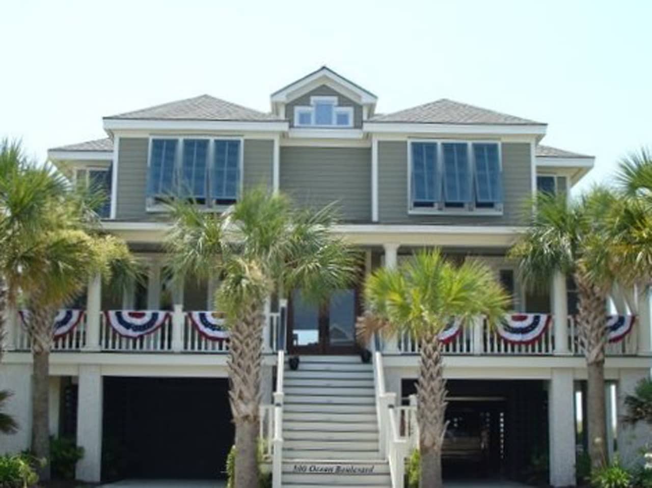 Bahama shutters on front of a beach house