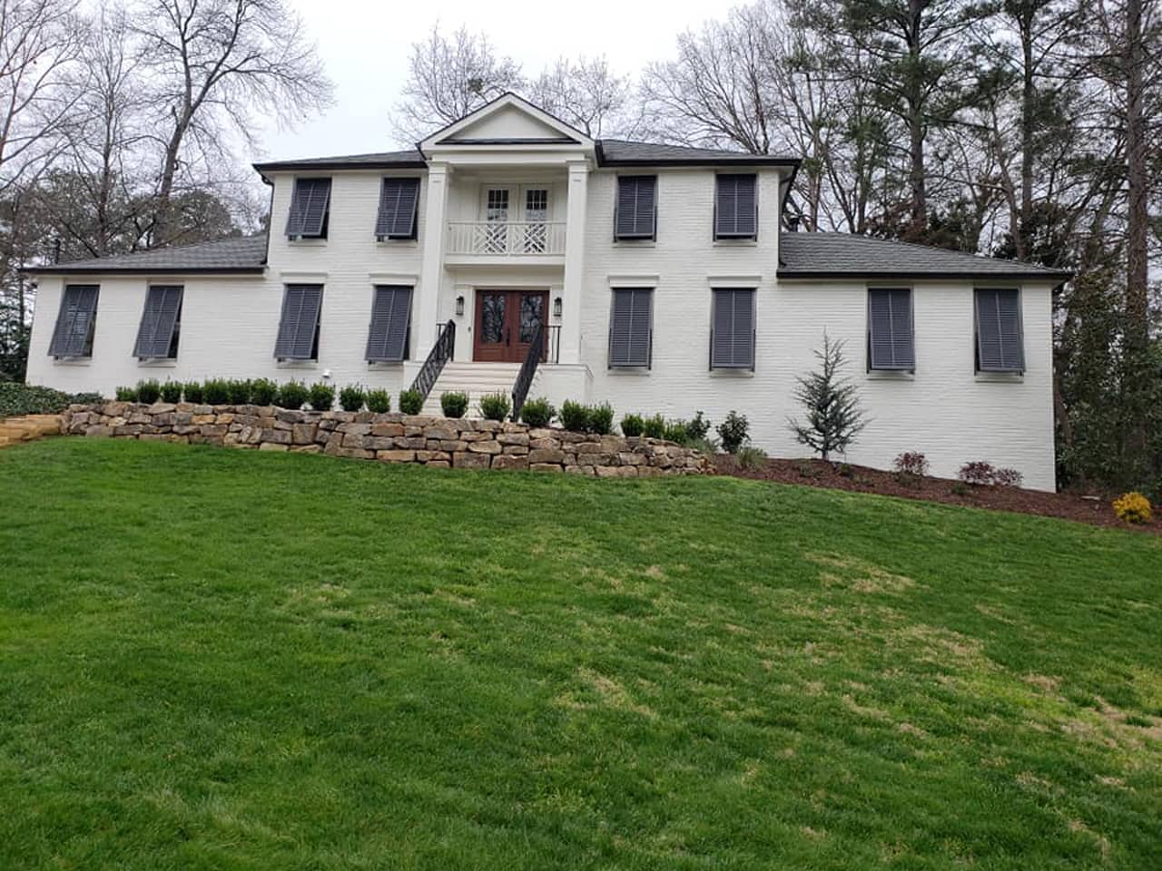 Colonial style house with Bahama shutters