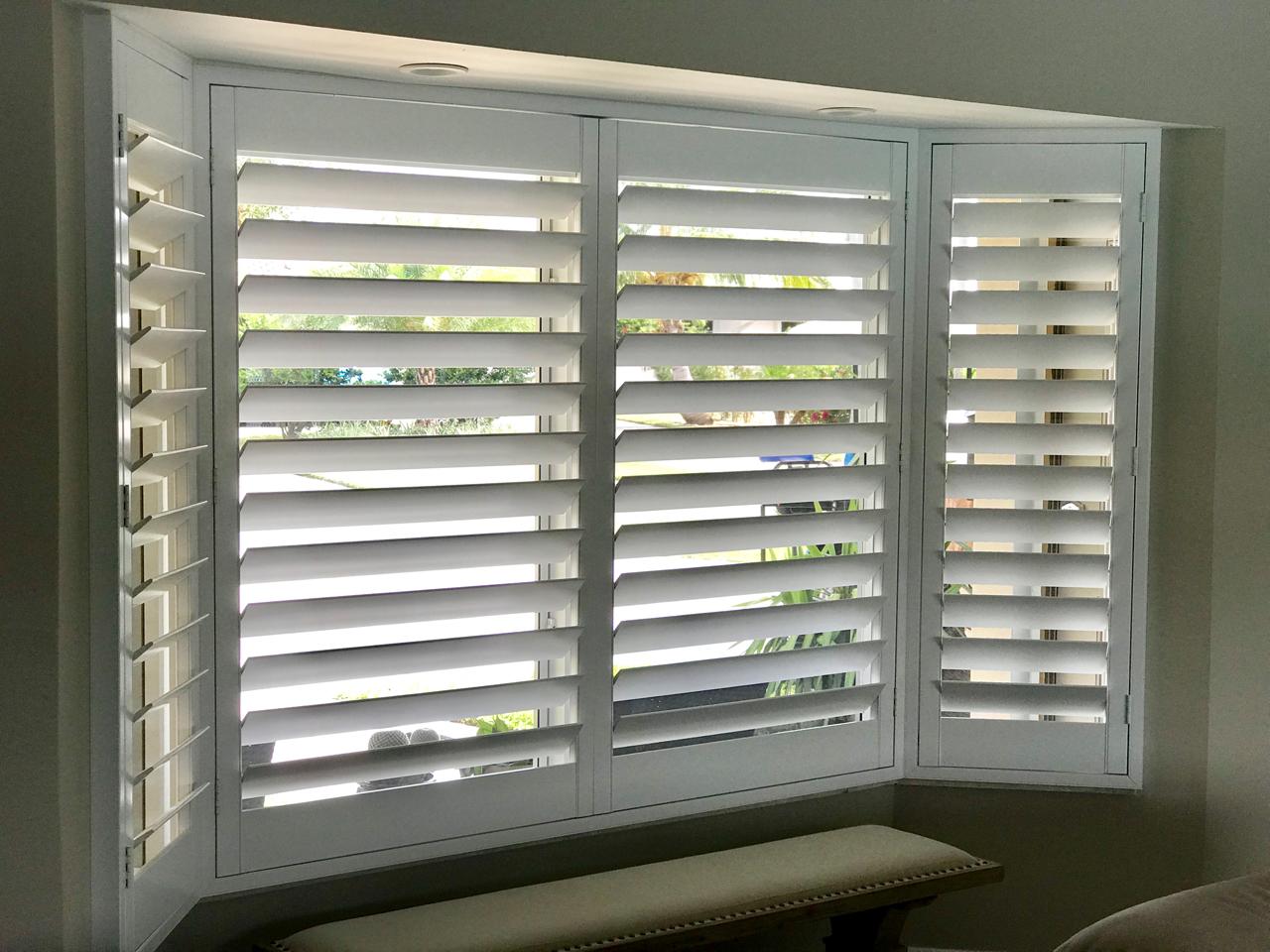 plantation shutters on bay window