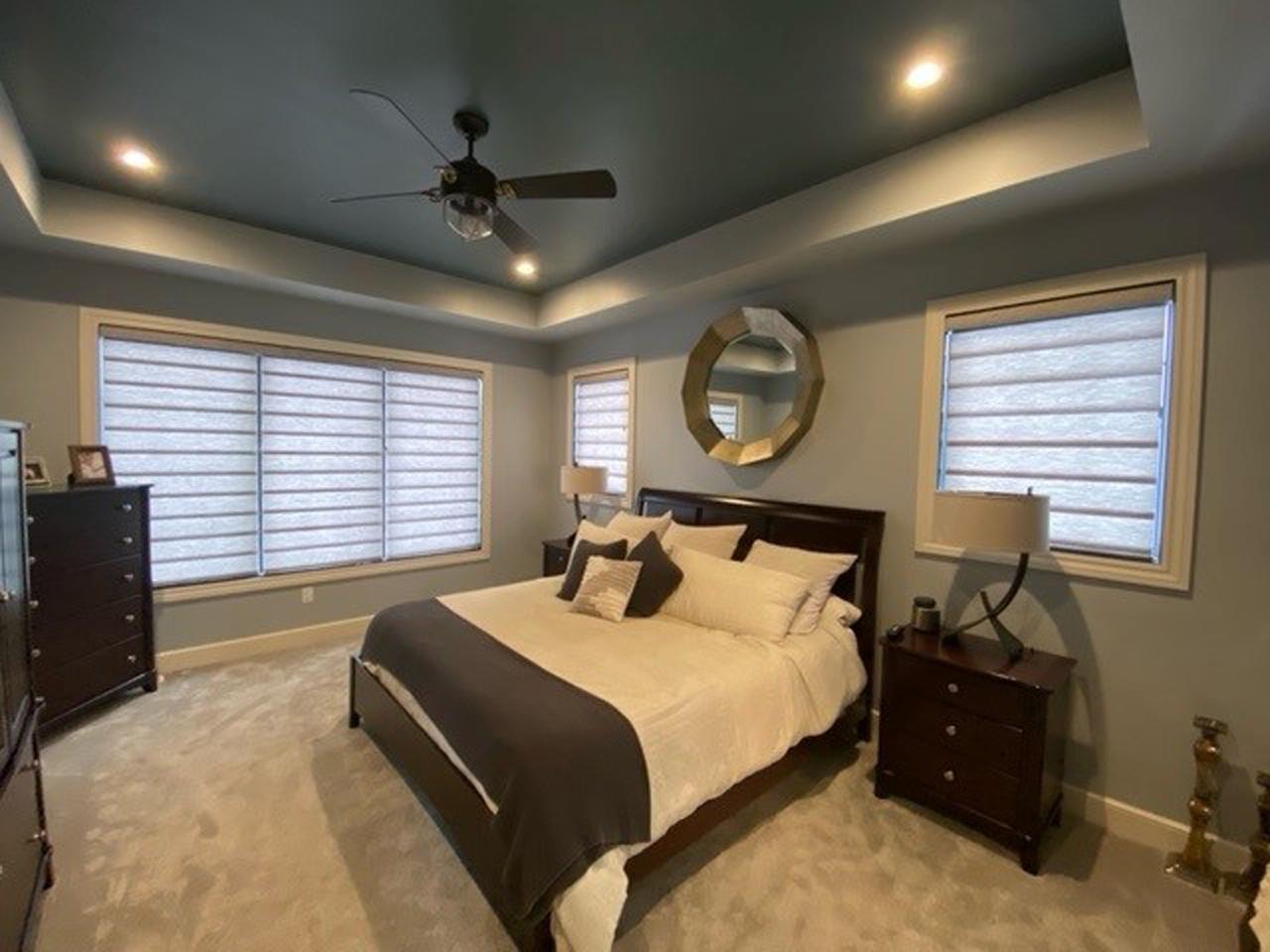 Modern Roman shades in a bedroom