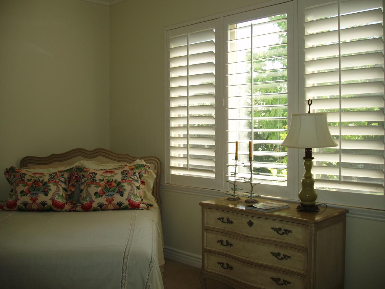 interior shutters on bedroom windows