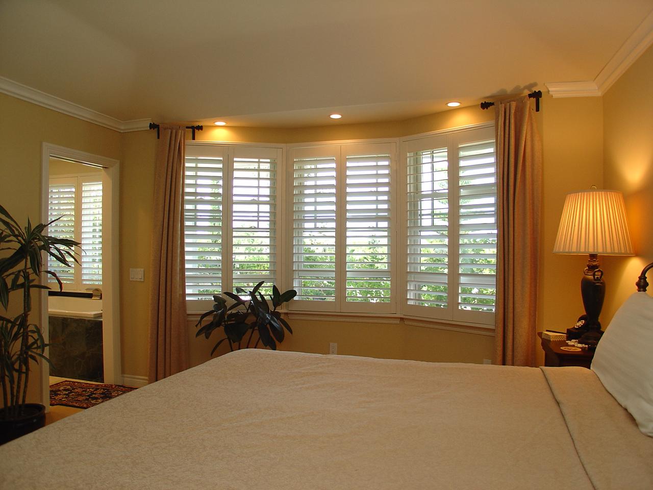 interior shutters on bedroom windows