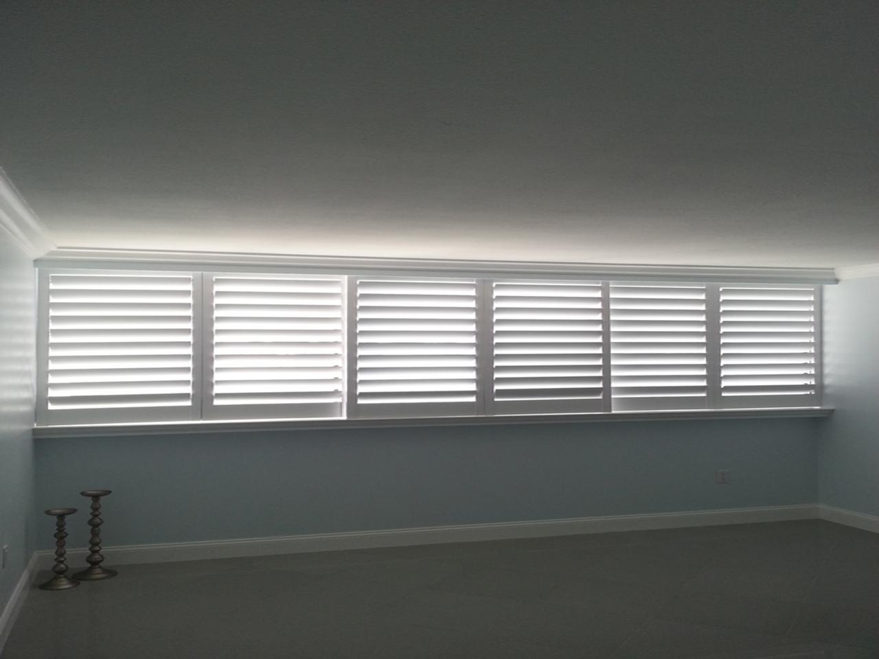 interior shutters on bedroom windows