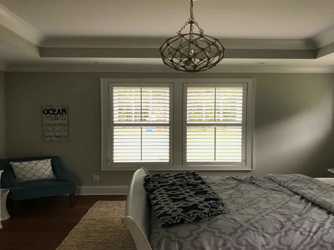 interior shutters on bedroom windows