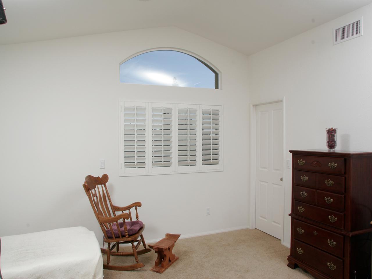 interior shutters on bedroom windows