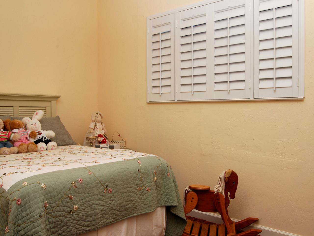 interior shutters on bedroom windows