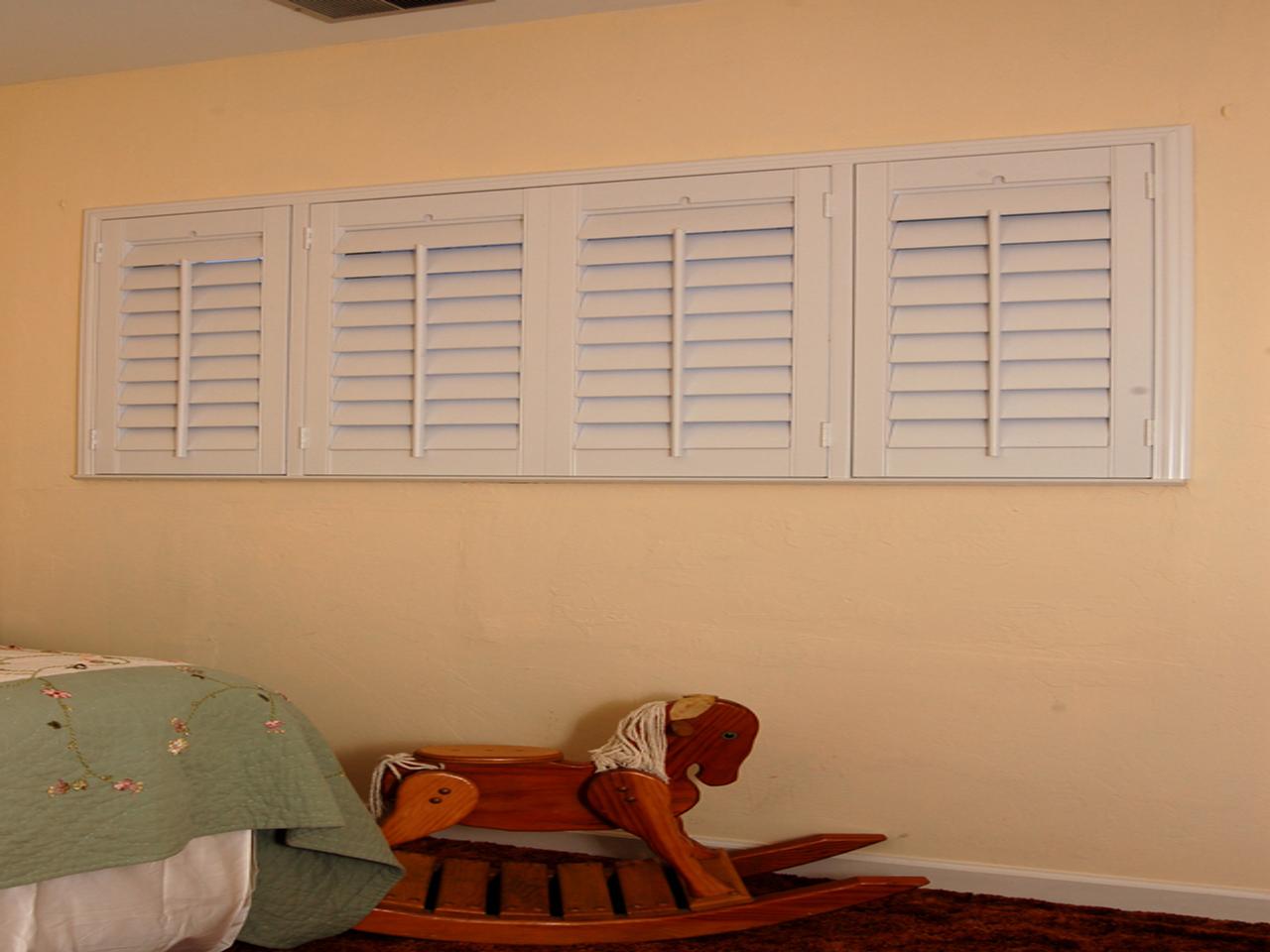 interior shutters on bedroom windows