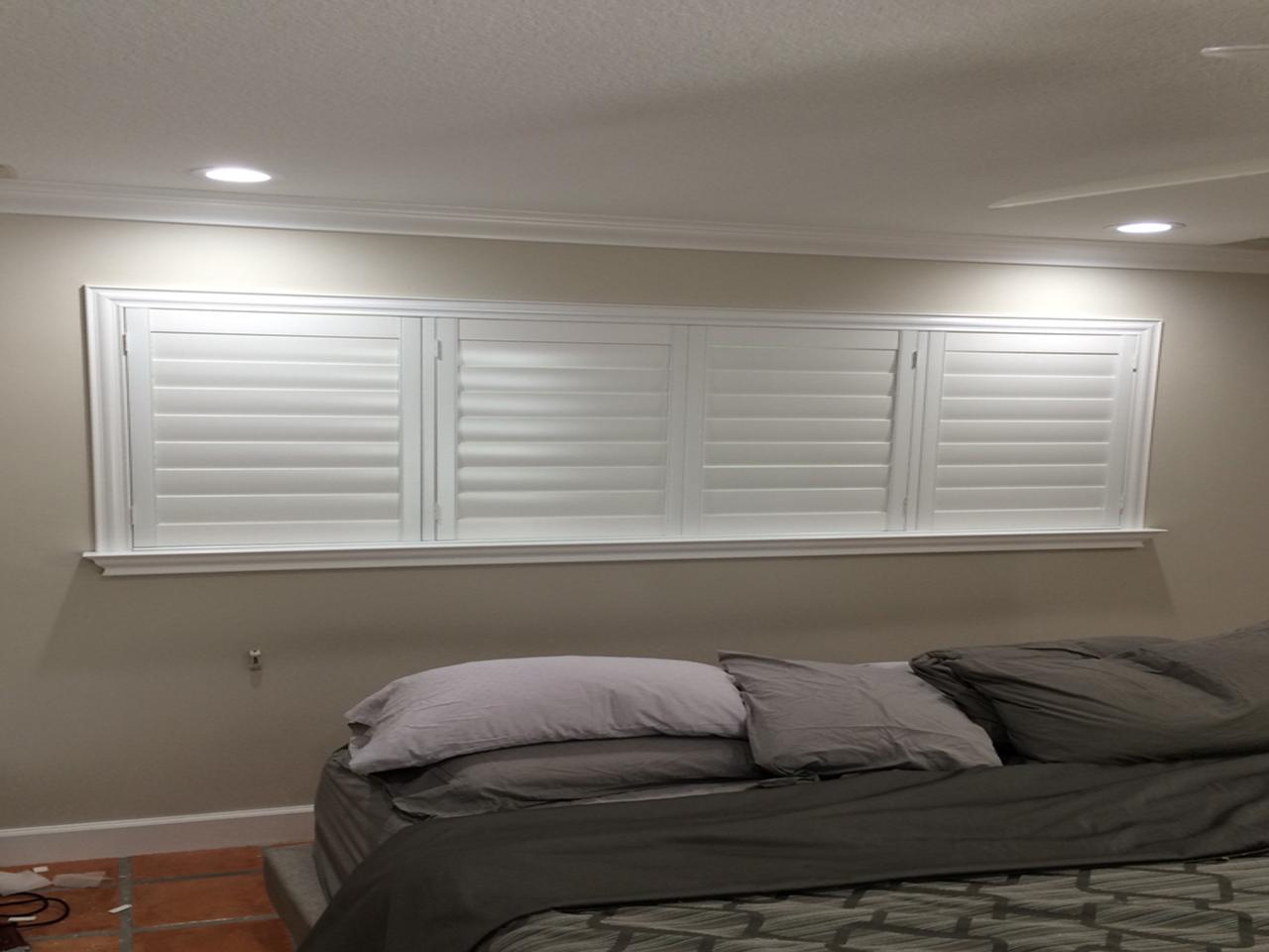 interior shutters on bedroom windows