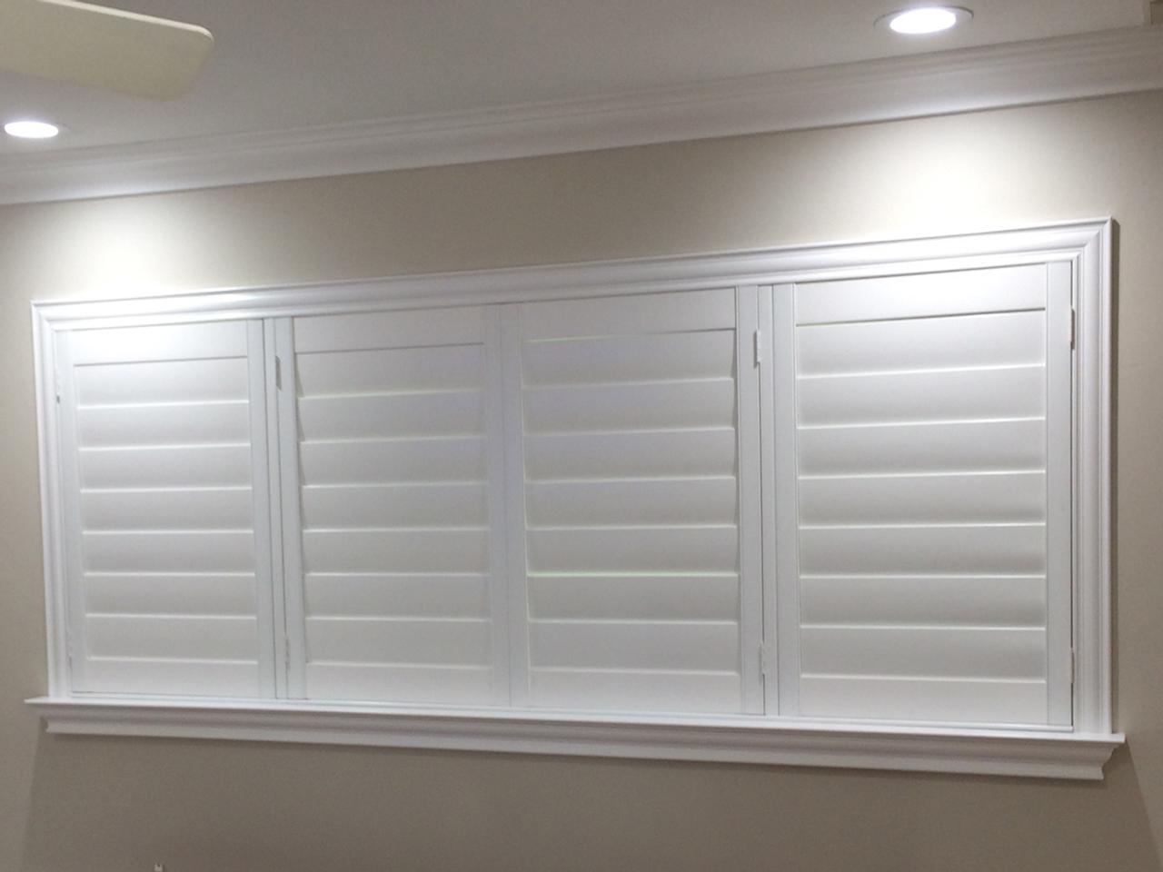 interior shutters on bedroom windows