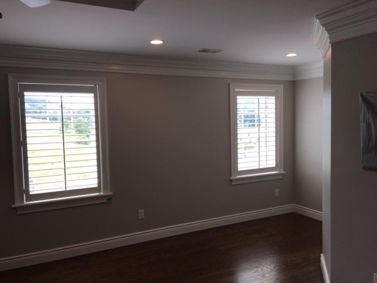 interior shutters on bedroom windows