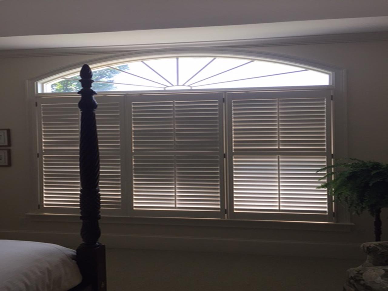 interior shutters on bedroom windows