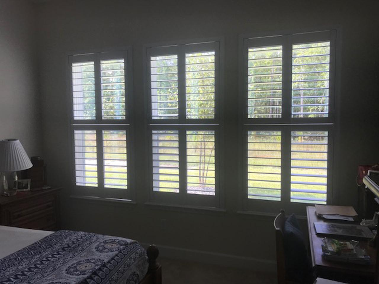 interior shutters on bedroom windows