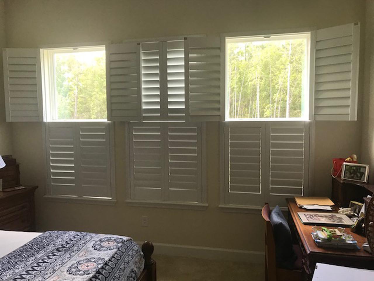 interior shutters on bedroom windows