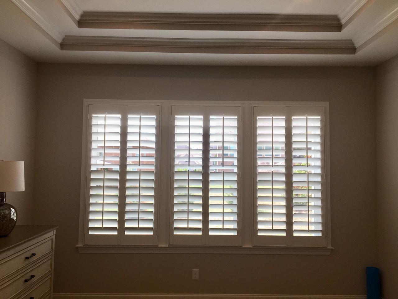 interior shutters on bedroom windows