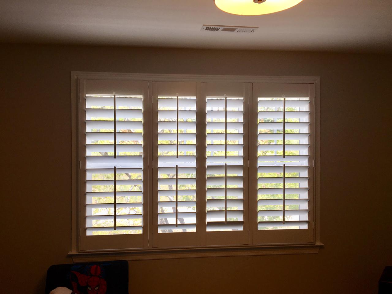 interior shutters on bedroom windows