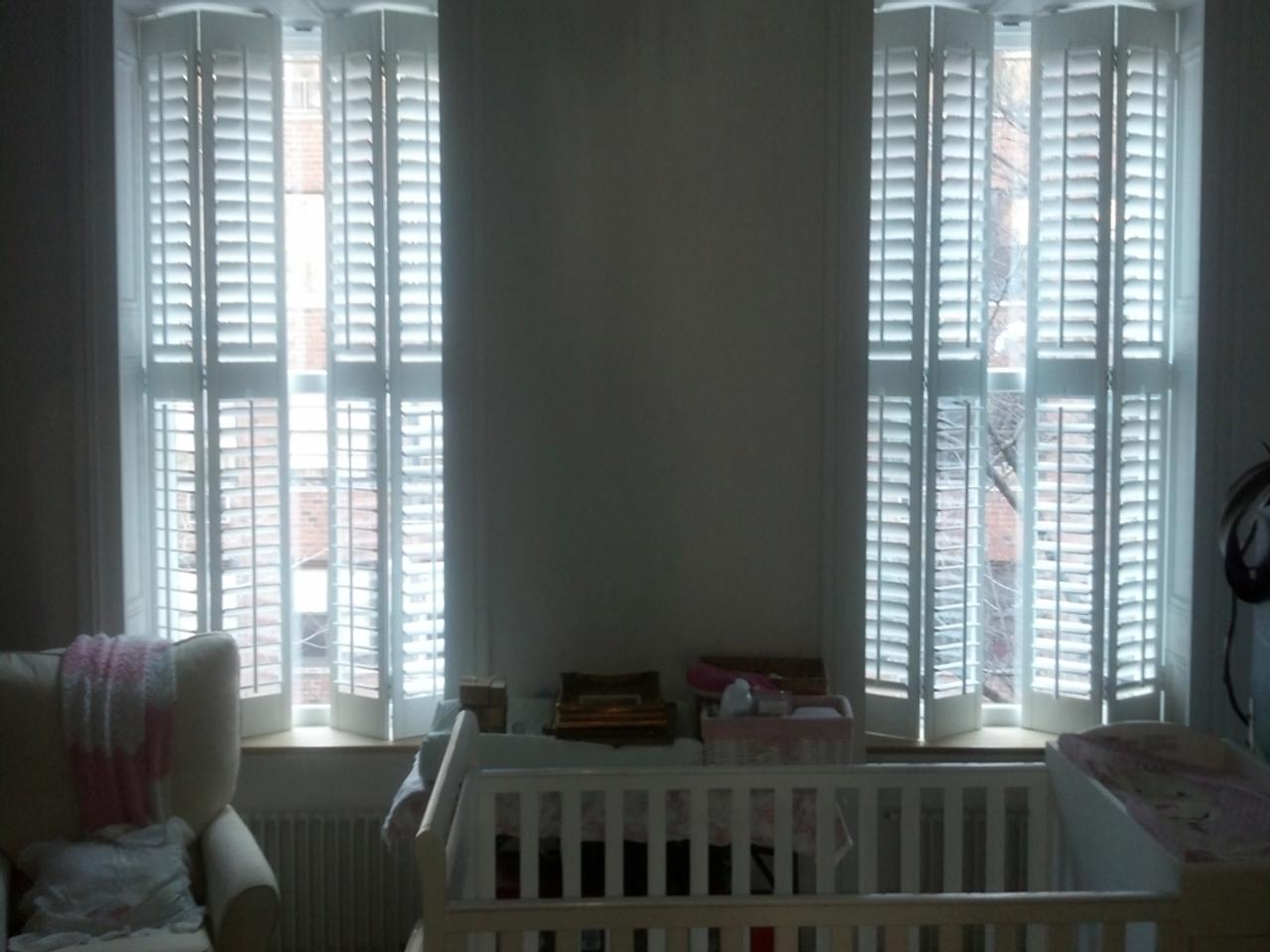 interior shutters on bedroom windows