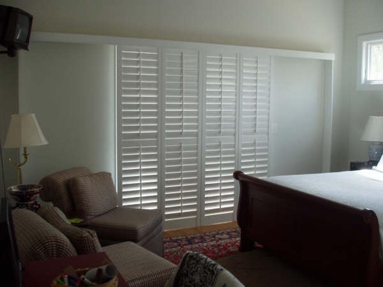 interior shutters on bedroom windows