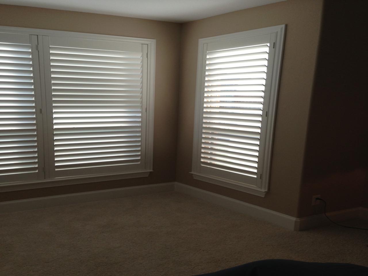 interior shutters on bedroom windows