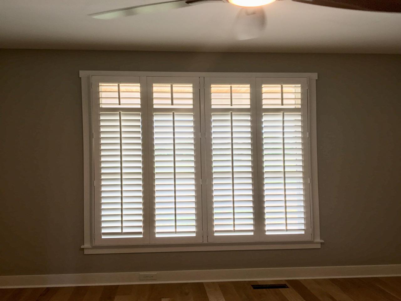 interior shutters on bedroom windows