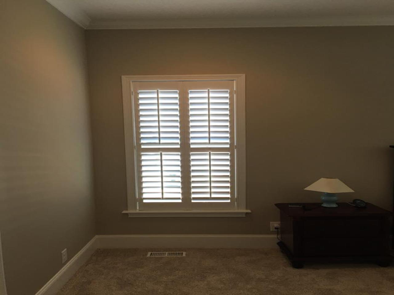 interior shutters on bedroom windows