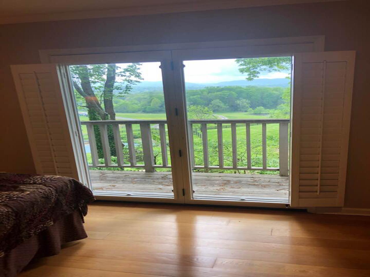 interior shutters on bedroom windows