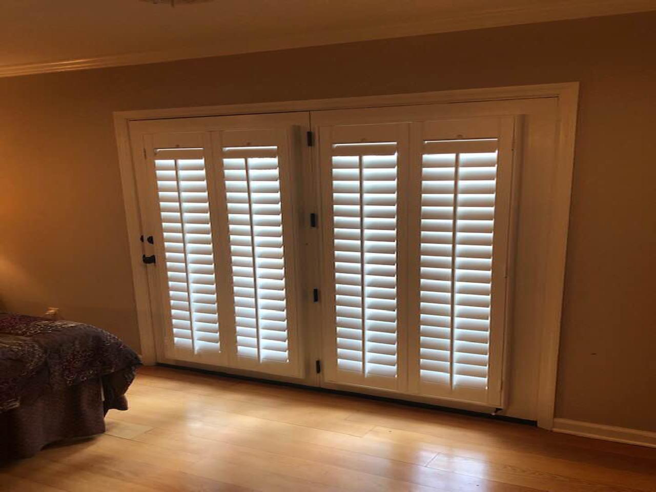 interior shutters on bedroom windows