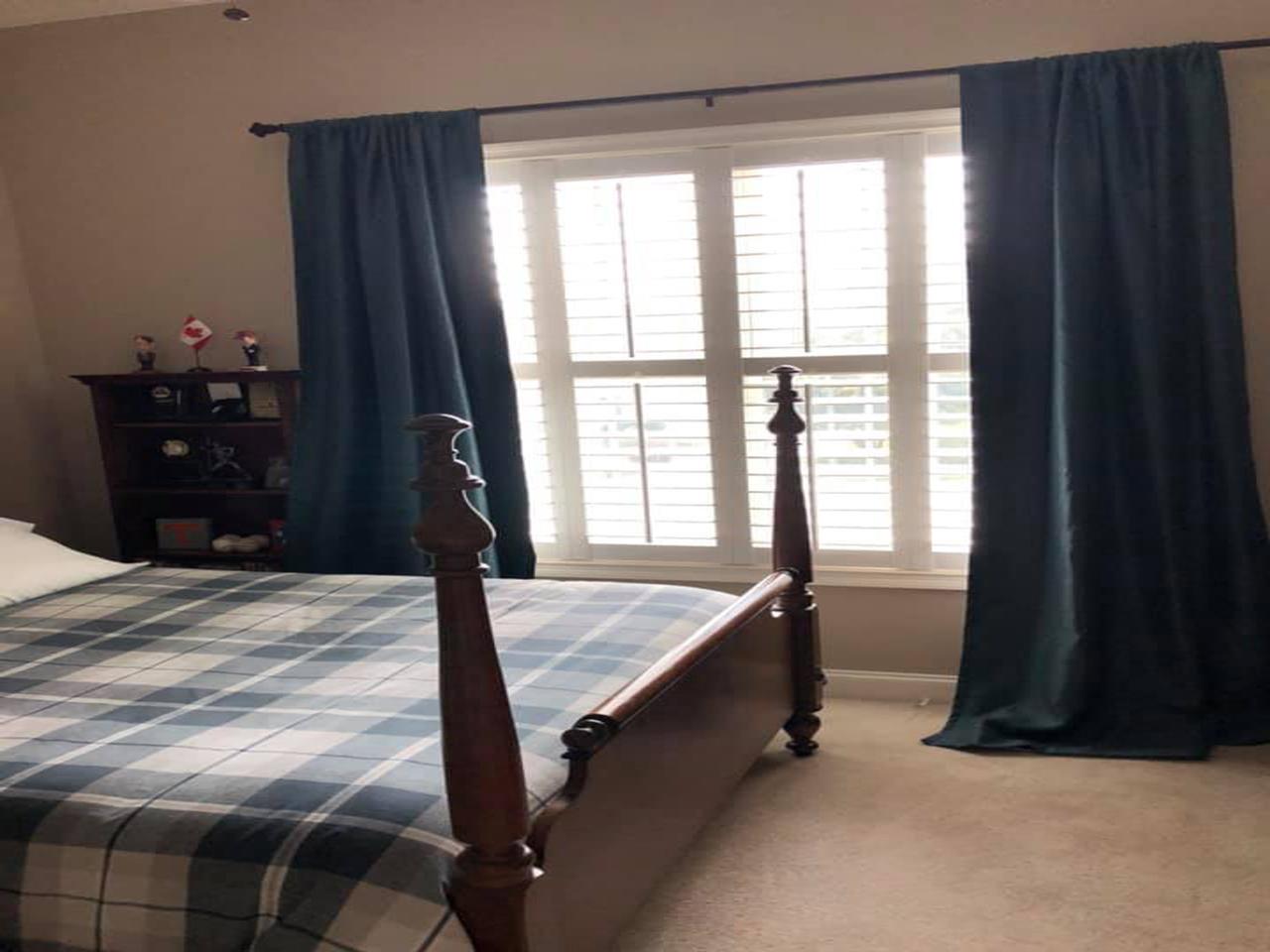 interior shutters on bedroom windows