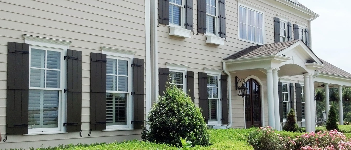 Board and batten shutters on a home