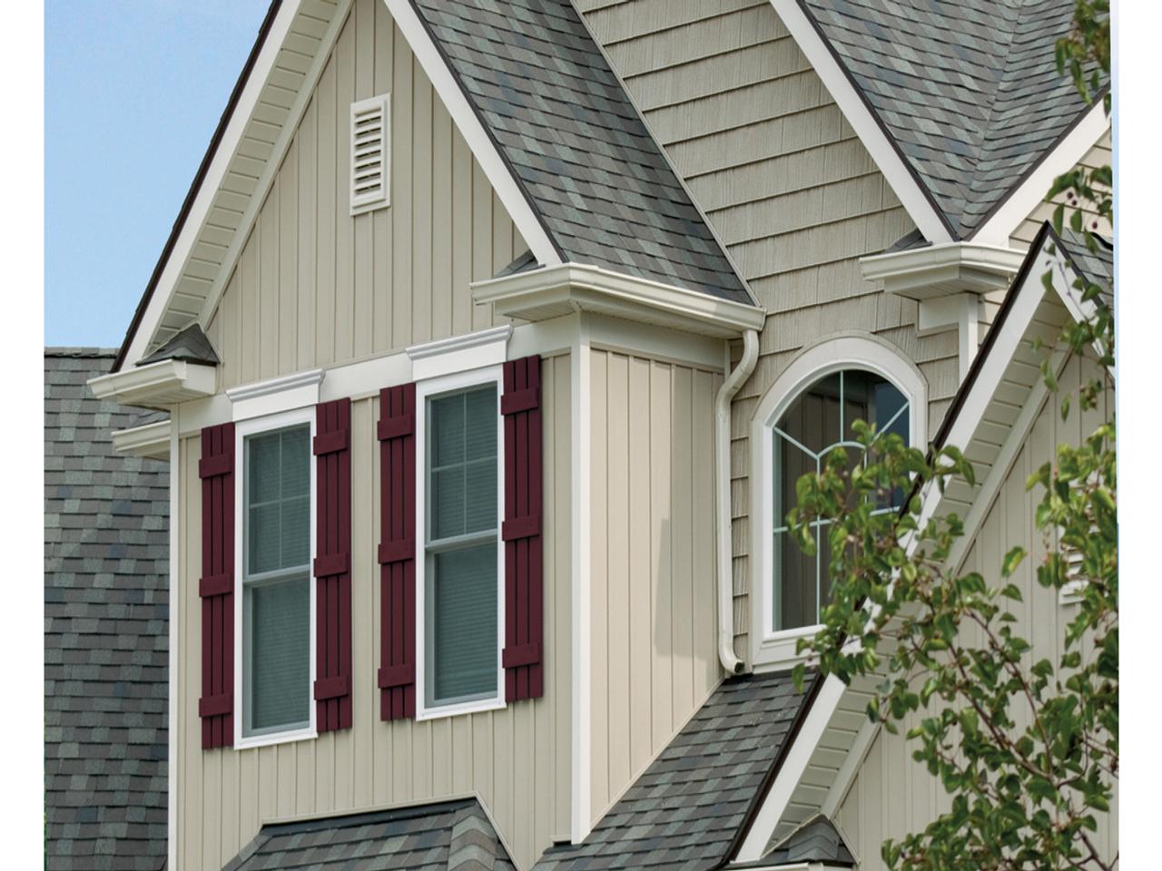 Board and batten shutters on house