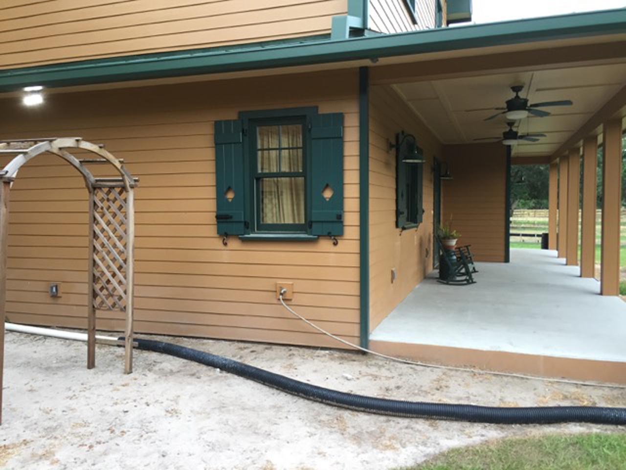 Board and batten shutters on a house